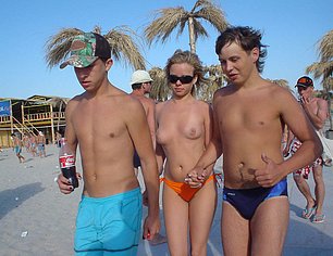 GIRLS AT BEACH WITH BIG TITS