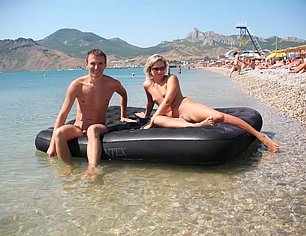 SUNBATHING ON THE BEACH