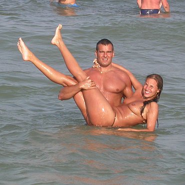 Oiled nudist beach