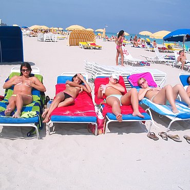 Beach sunbathing teen