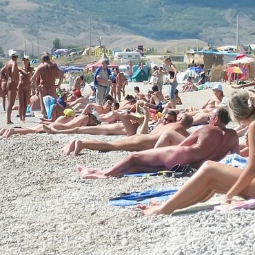 Round boobs on beach