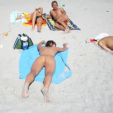 Girl showing ass fucked on beach