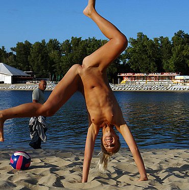FAMILY NATURISTS WITH YOUNG NUDE SON