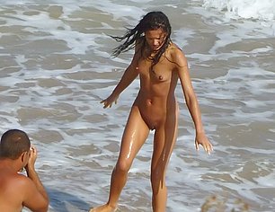 KATIE PRICE SPREAD LEGS NAKED BEACH PICTURES