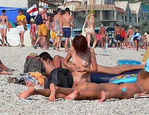 MEN WITH HARD COCKS AT NUDE BEACH