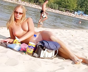 Nude granny on beach