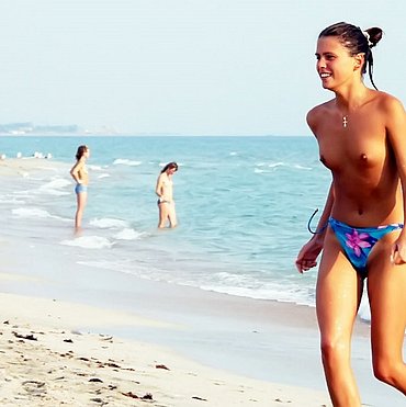 Young school teen enjoy at nude beach