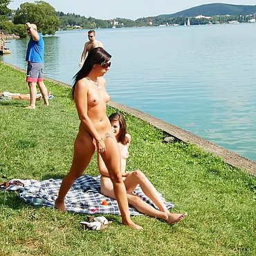 Women on nudist beach looking at mens dicks