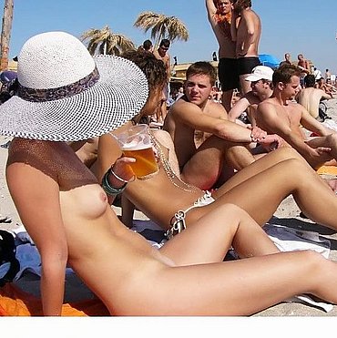 GROUP PISSING ON NUDE BEACH