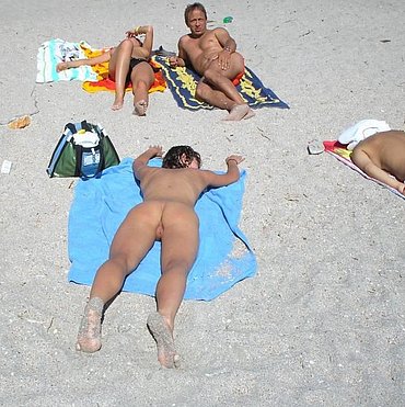 Nudism young family photo