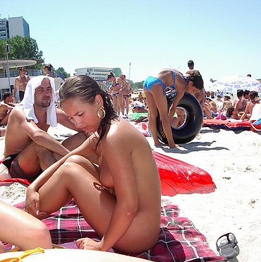 Topless beach babes